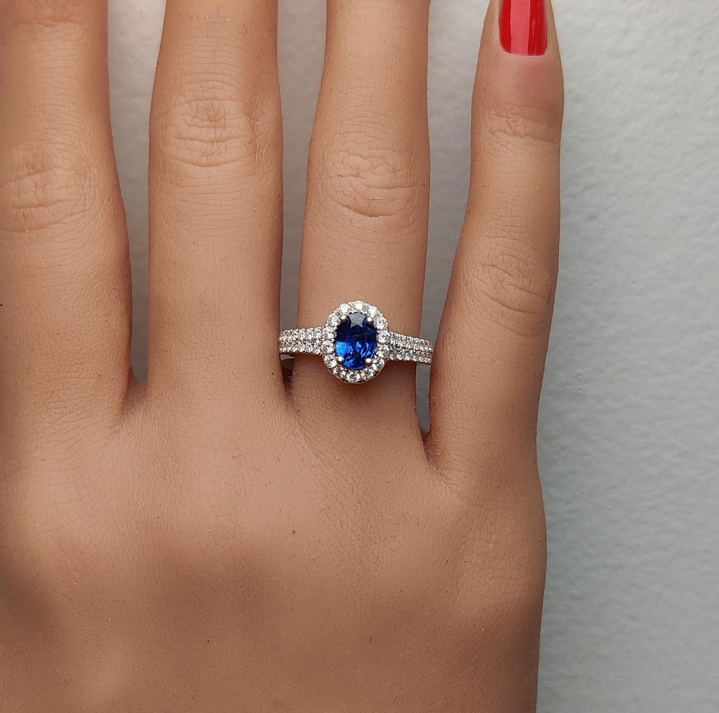 Natural Blue Oval Sapphire and White Diamond 1.60 Carat TW Gold Cocktail Ring