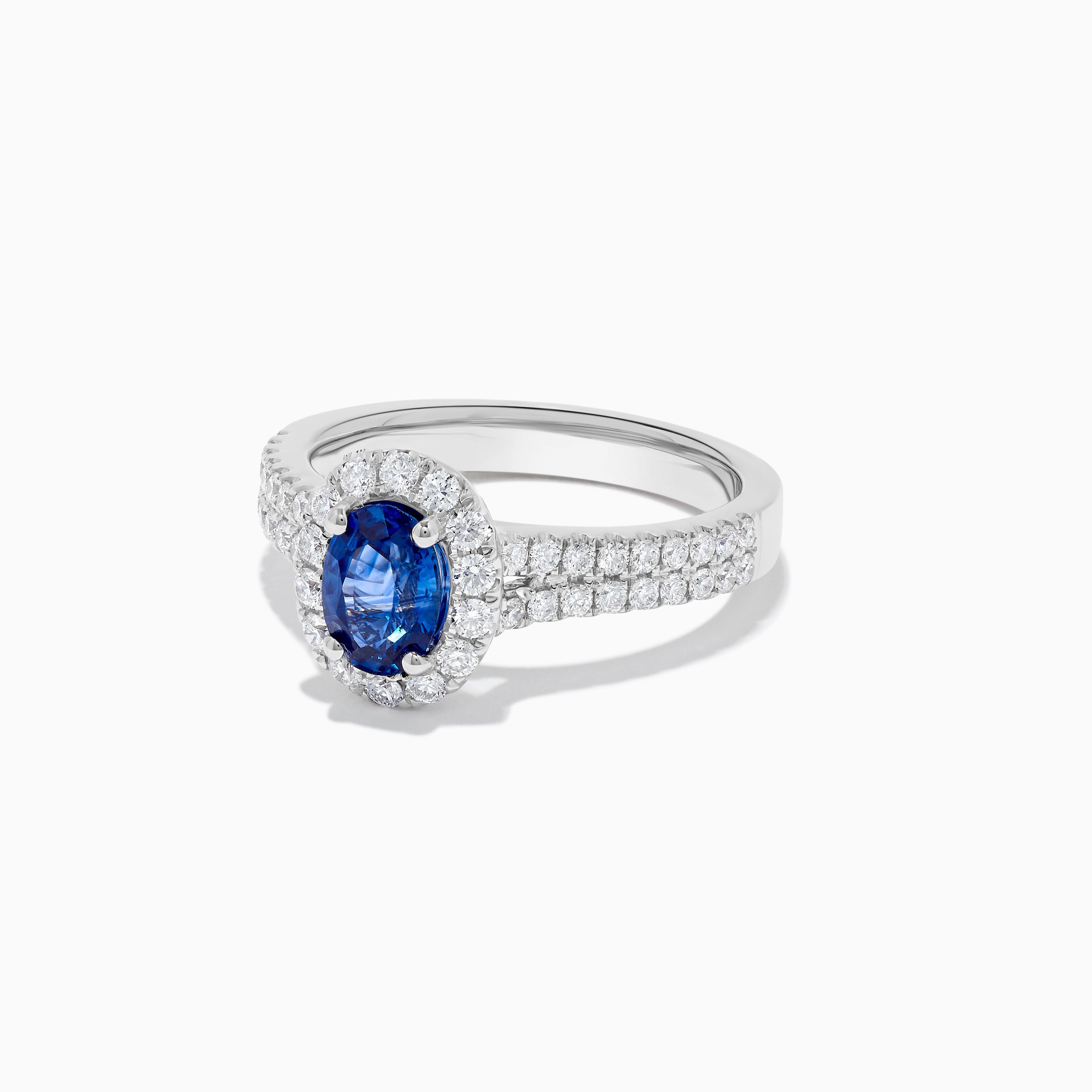 Natural Blue Oval Sapphire and White Diamond 1.60 Carat TW Gold Cocktail Ring