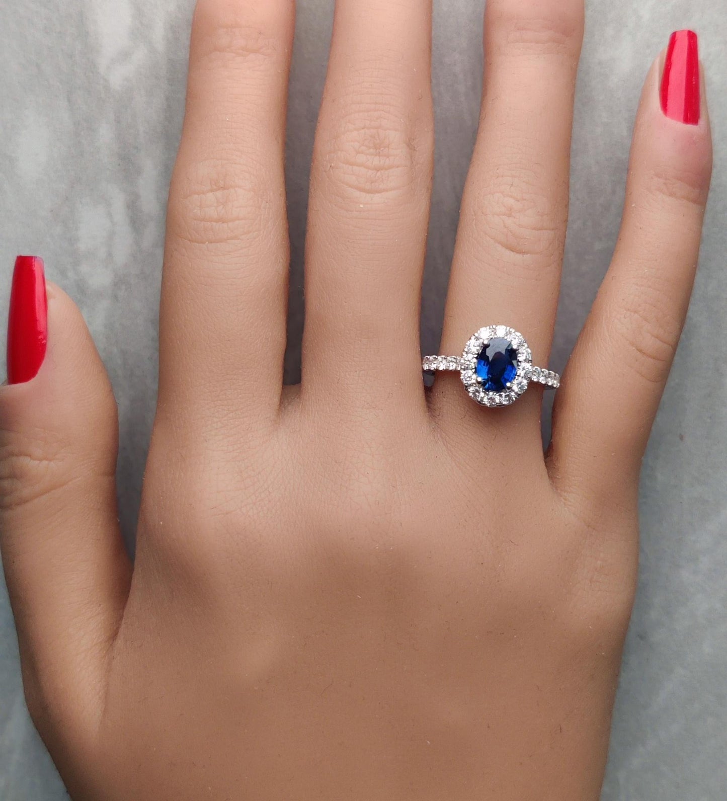 Natural Blue Oval Sapphire and White Diamond 1.88 Carat TW Gold Cocktail Ring