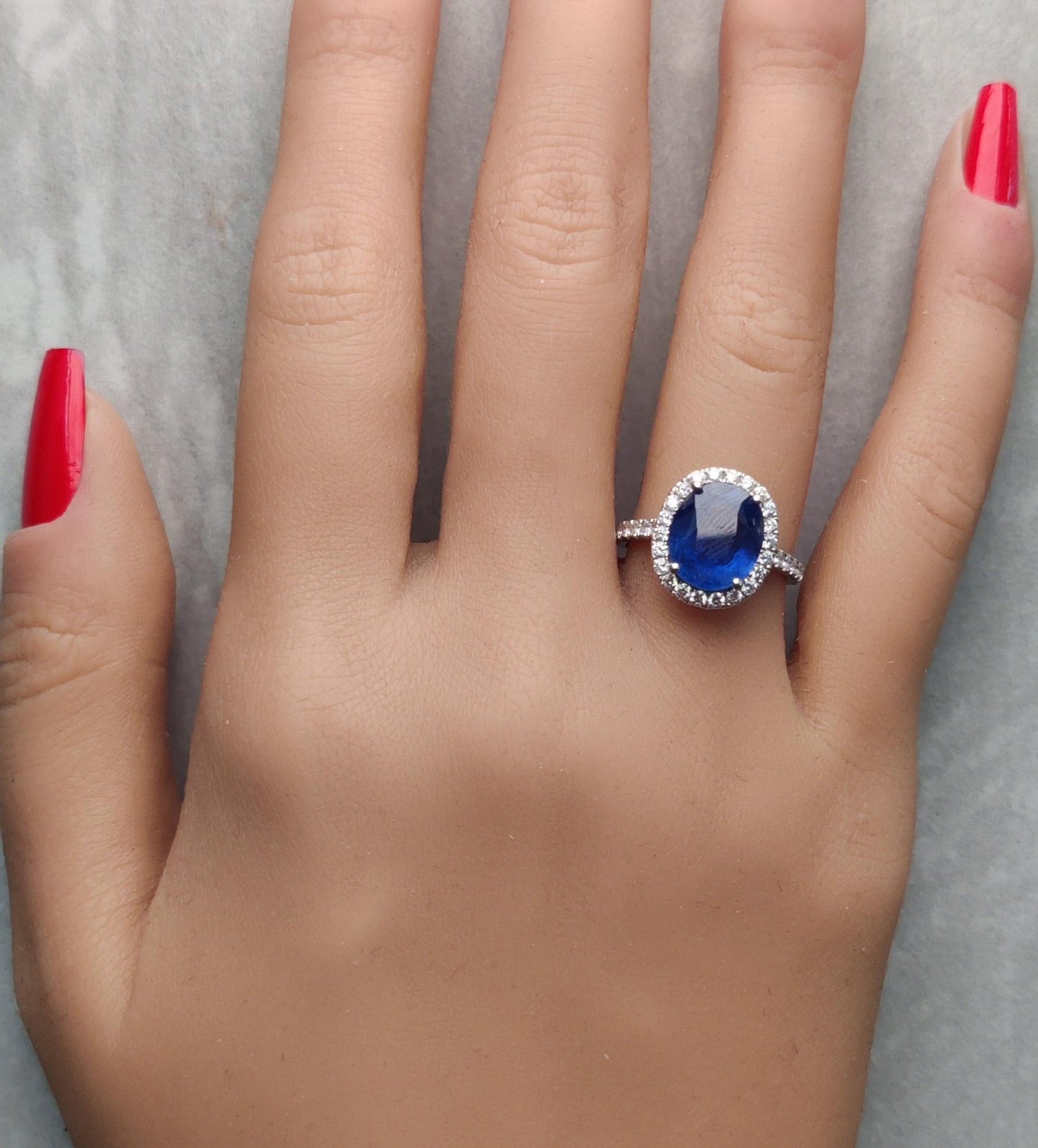 Natural Blue Oval Sapphire and White Diamond 4.78 Carat TW Gold Cocktail Ring