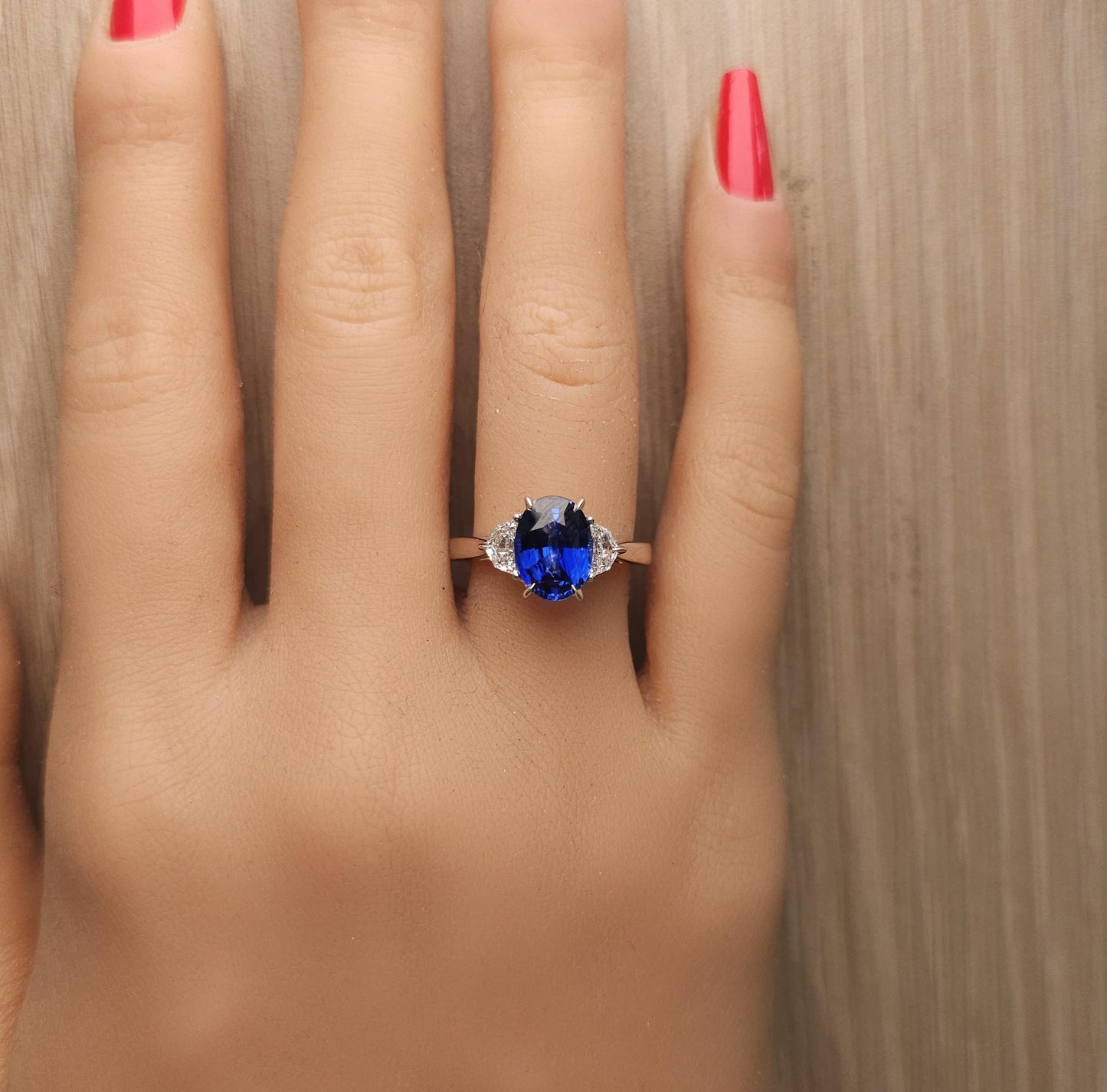 Natural Blue Oval Sapphire and White Diamond 3.27 Carat TW Gold Cocktail Ring