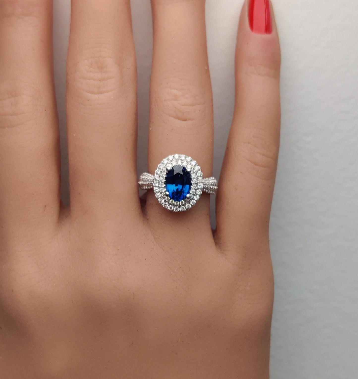 Natural Blue Oval Sapphire and White Diamond 2.81 Carat TW Gold Cocktail Ring