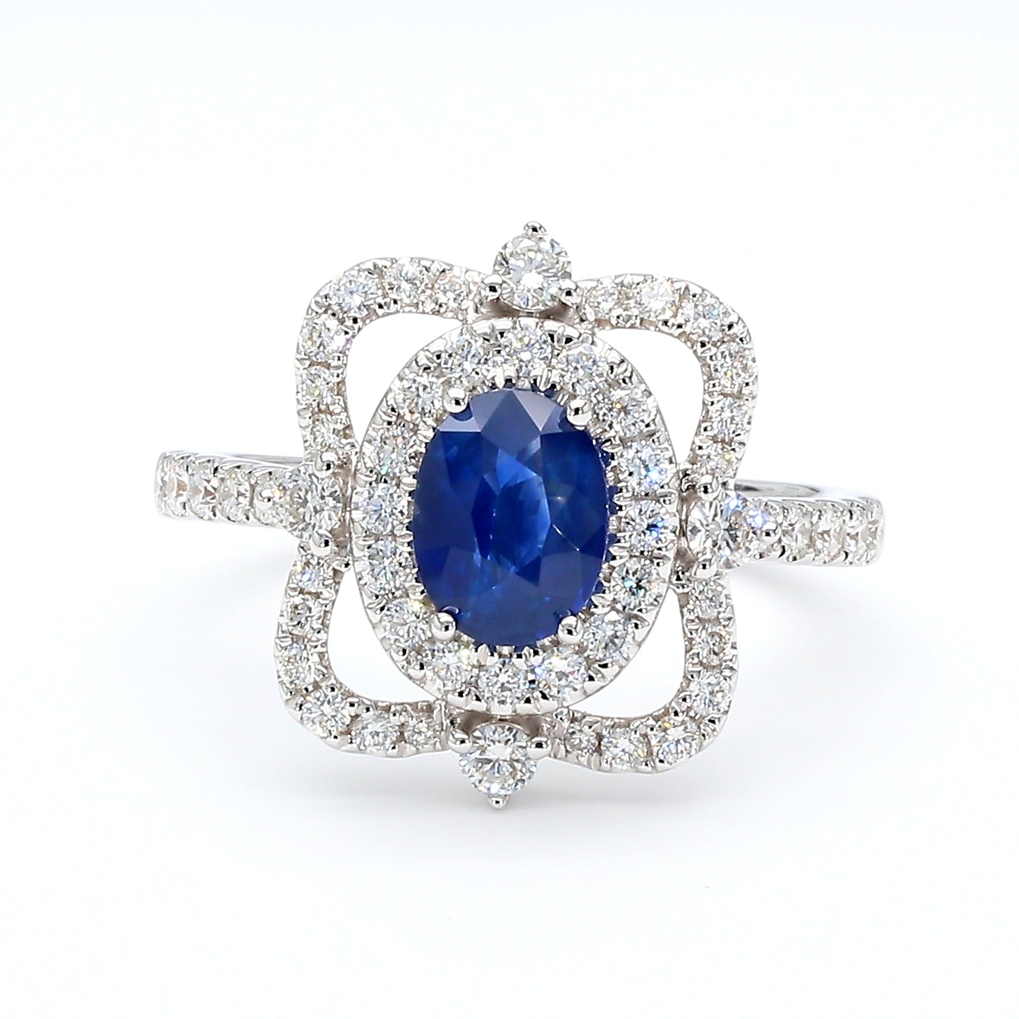 Natural Blue Oval Sapphire and Diamond 1.62 Carat TW Gold Ring