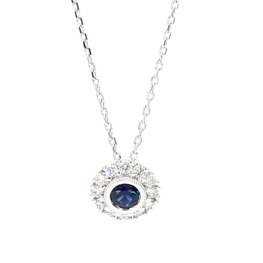 Natural Blue Round Sapphire and Diamond 0.57 Carat TW Gold Pendant