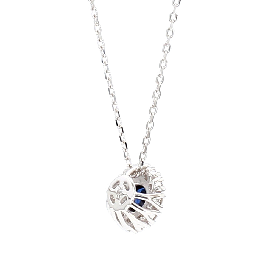 Natural Blue Round Sapphire and Diamond 0.57 Carat TW Gold Pendant