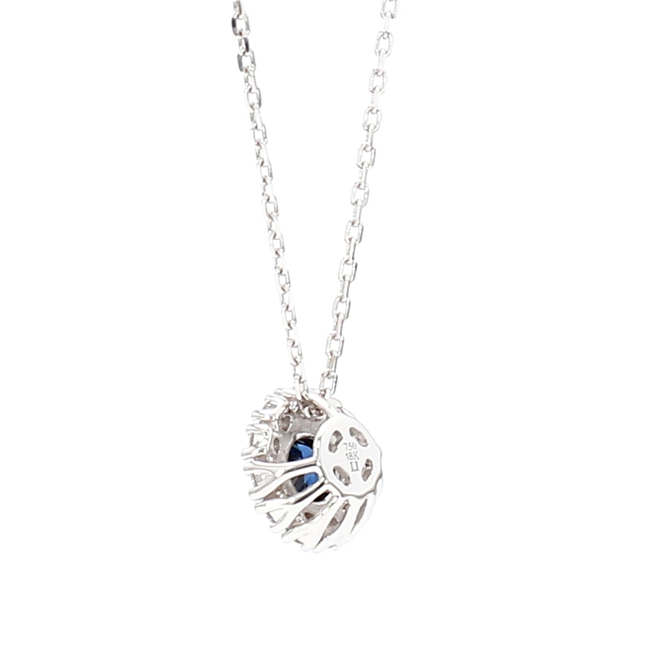 Natural Blue Round Sapphire and Diamond 0.57 Carat TW Gold Pendant