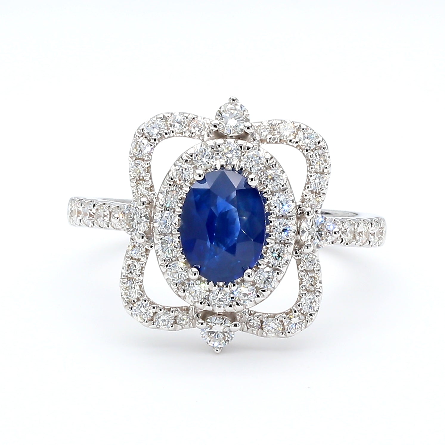 Natural Blue Oval Sapphire and Diamond 1.62 Carat TW Gold Ring