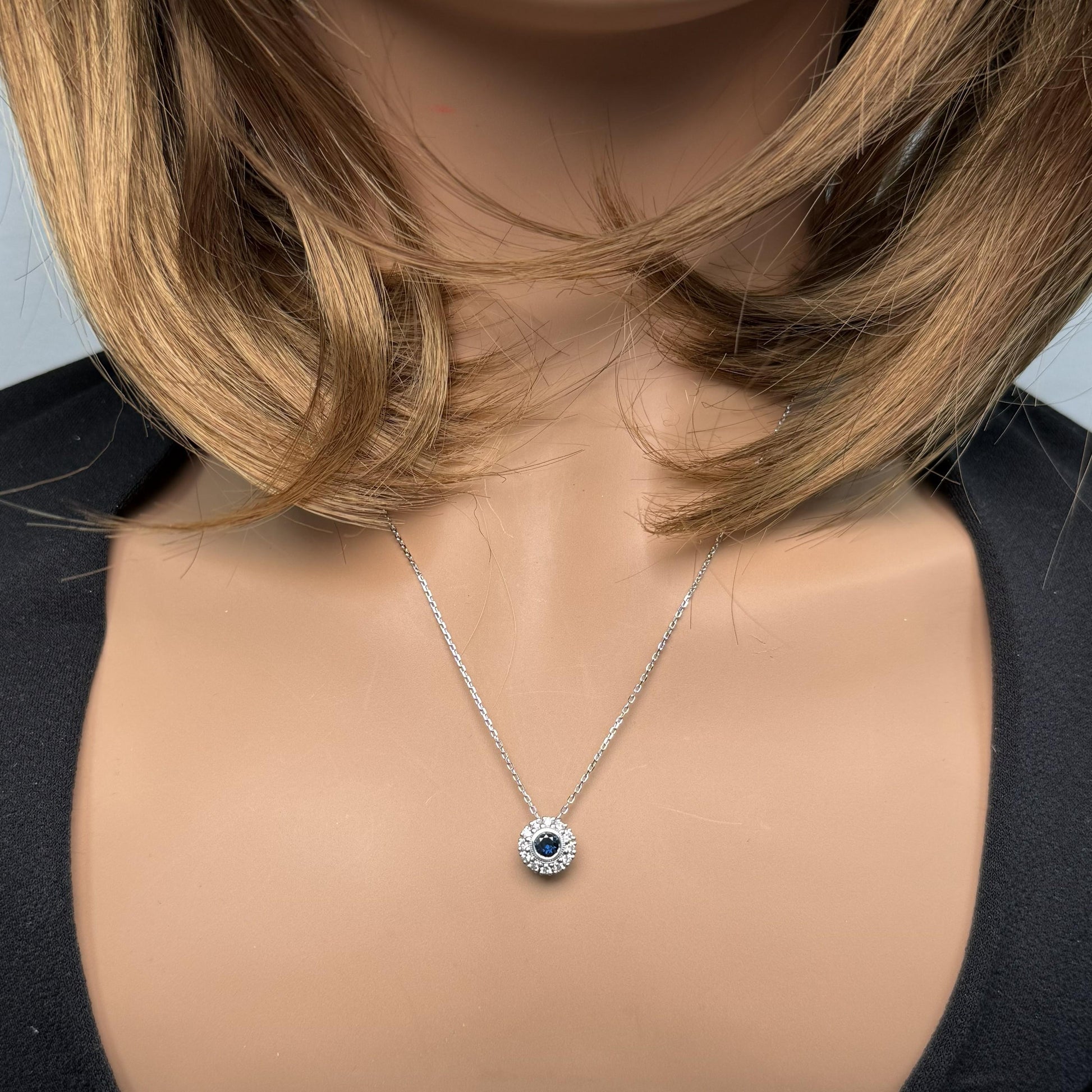 Natural Blue Round Sapphire and Diamond 0.57 Carat TW Gold Pendant