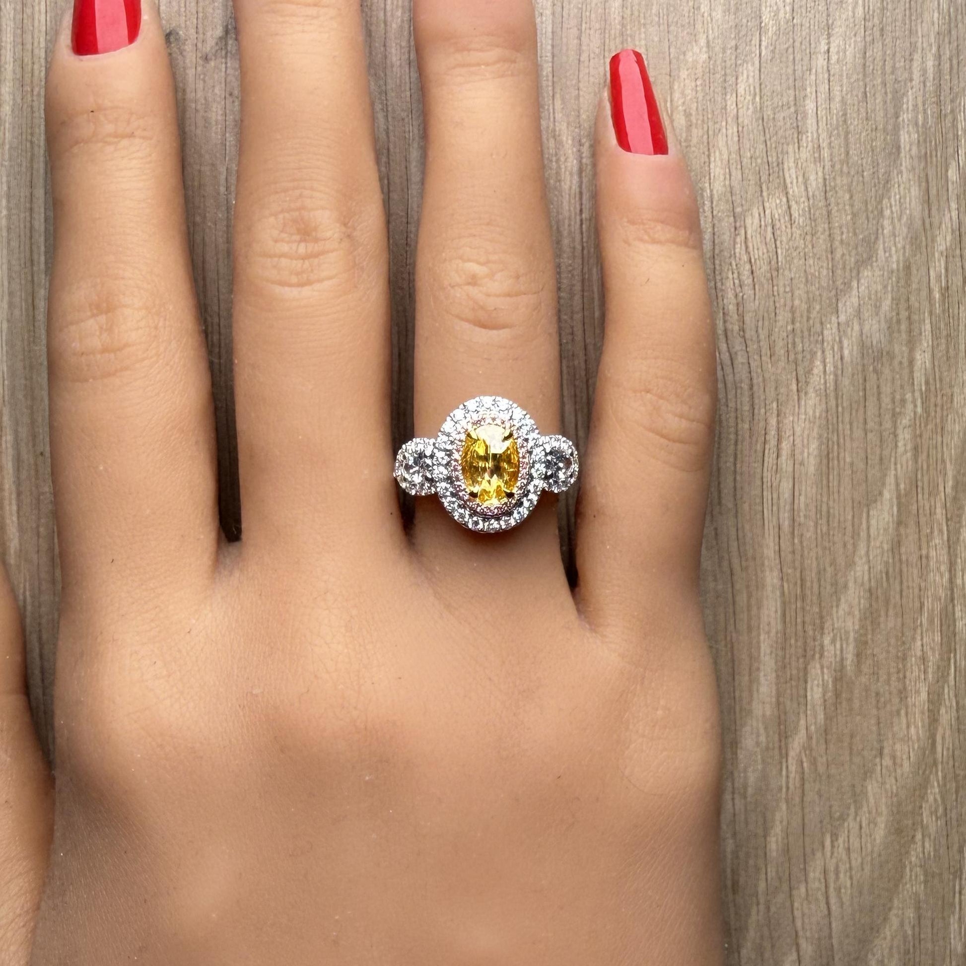 GIA Certified Fancy Vivid Yellow Oval Diamond 2.04 Carat TW Gold Cocktail Ring