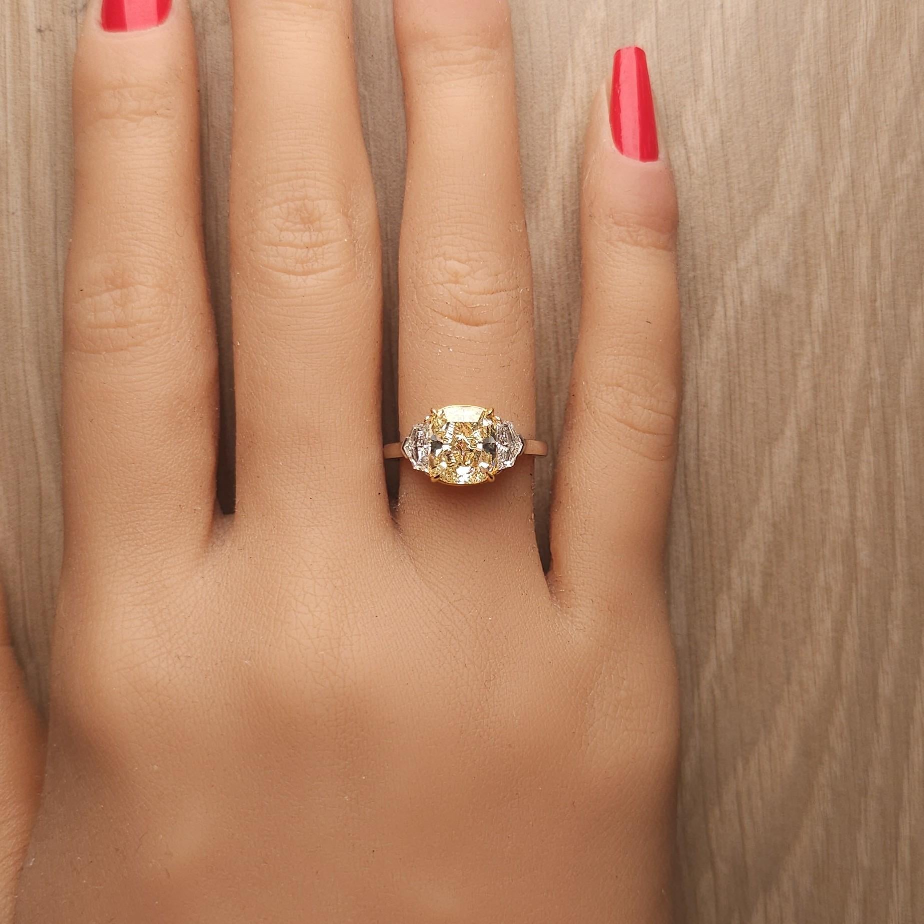 GIA Certified Fancy Light Yellow Cushion Diamond 3.66 Carat TW Platinum Ring