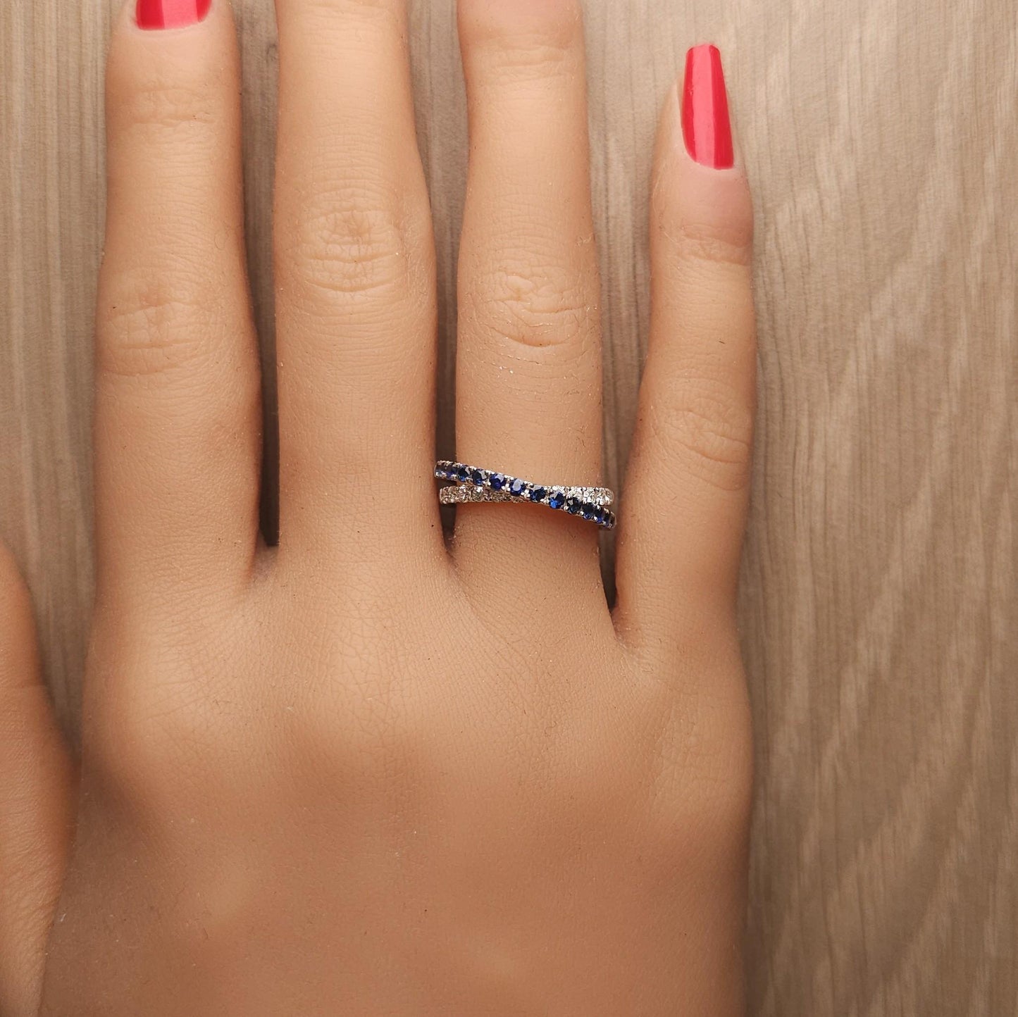 Natural Blue Round Sapphire and White Diamond .84 Carat TW White Gold Band