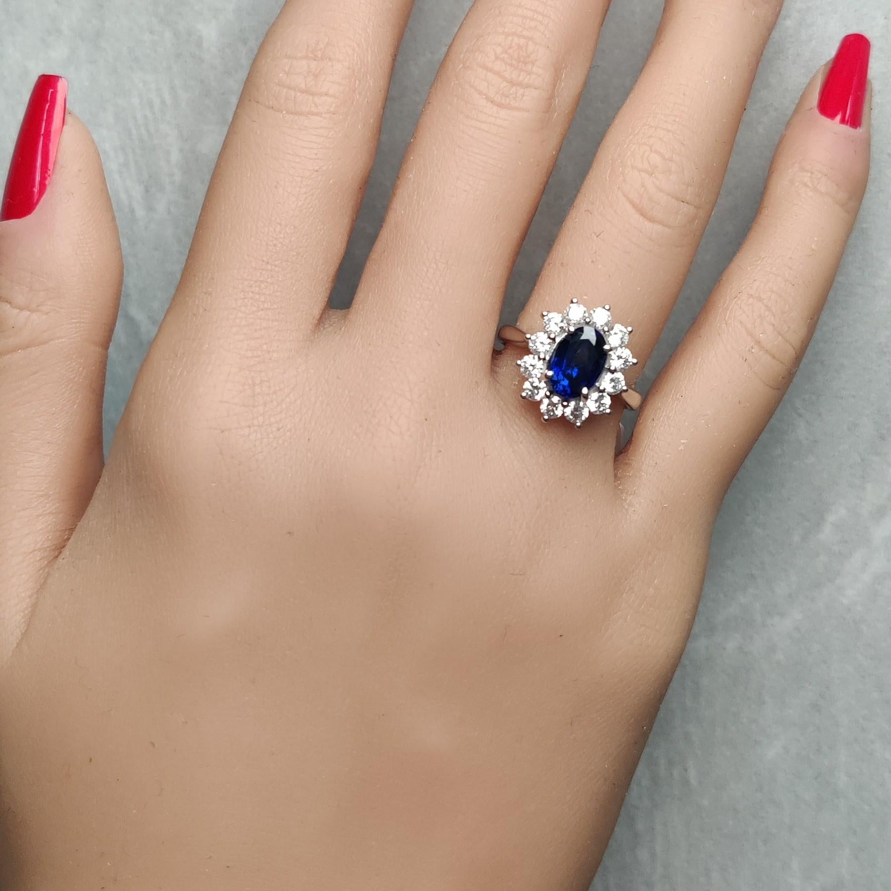 Natural Blue Oval Sapphire and White Diamond 2.88 Carat TW Gold Cocktail Ring