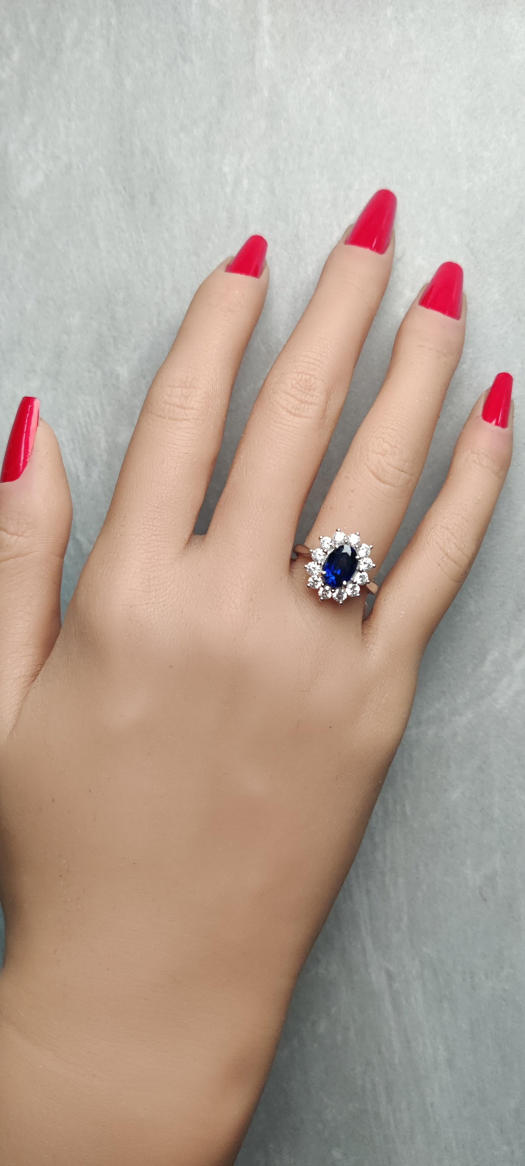 Natural Blue Oval Sapphire and White Diamond 2.88 Carat TW Gold Cocktail Ring