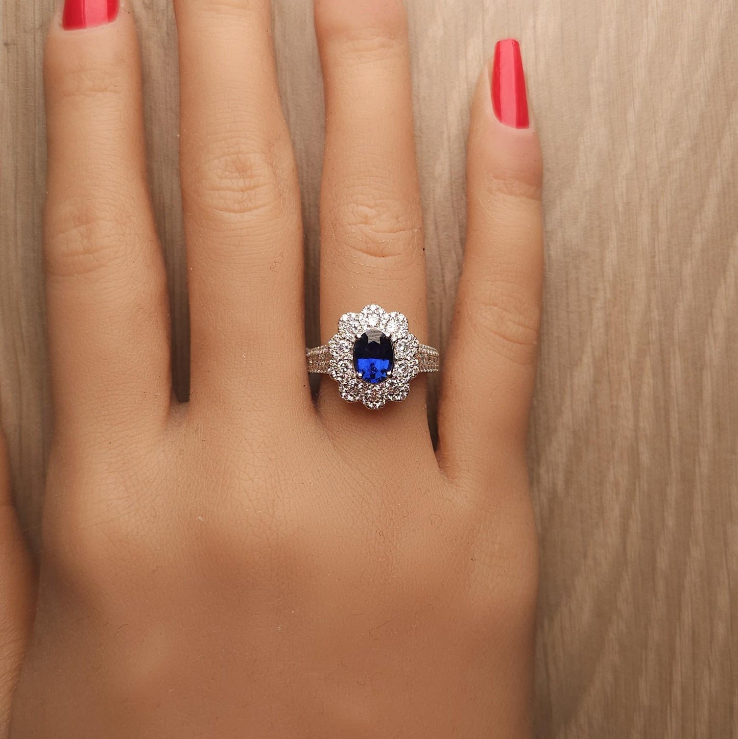 Natural Blue Oval Sapphire and White Diamond 2.44 Carat TW Gold Cocktail Ring