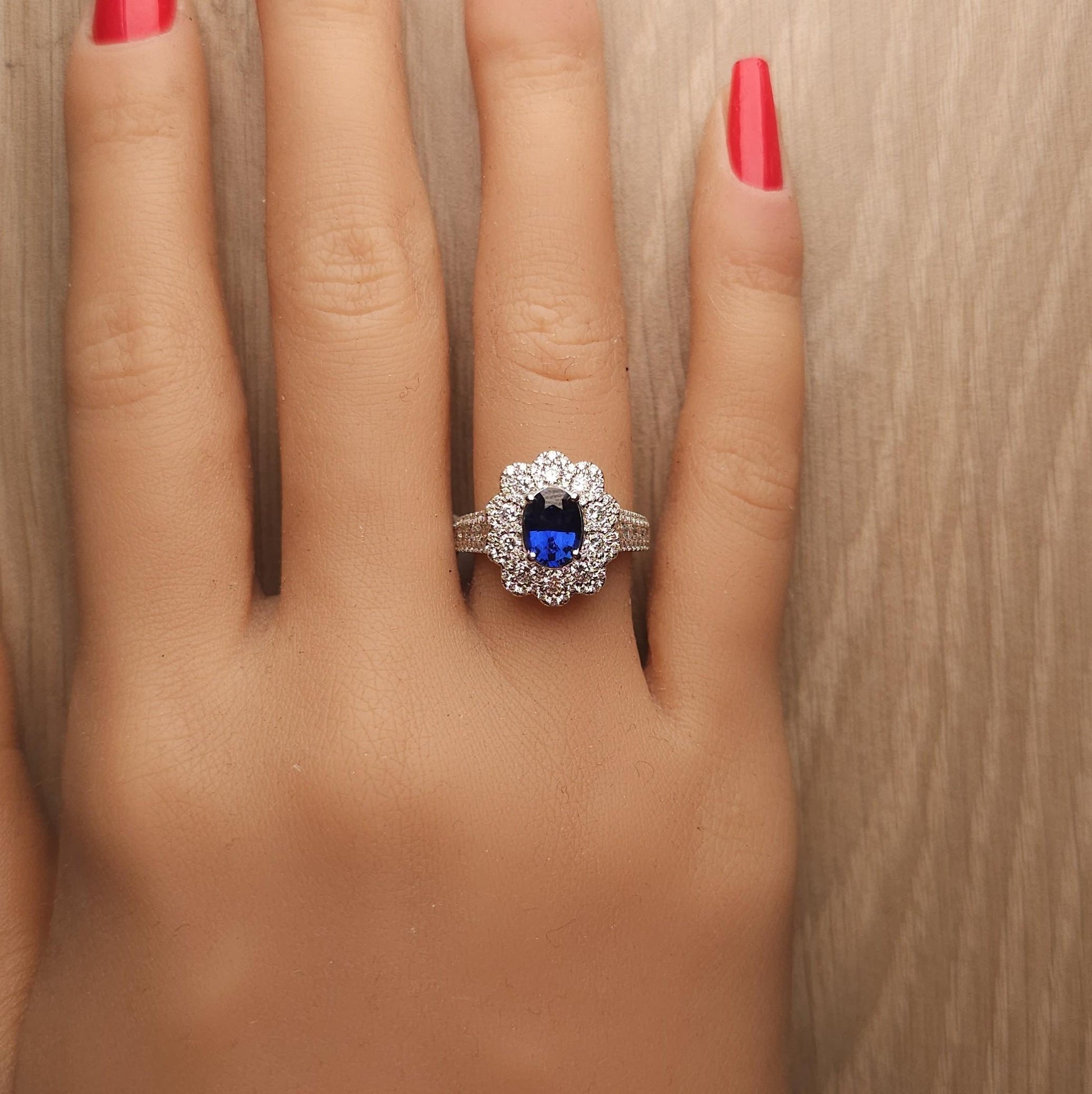 Natural Blue Oval Sapphire and White Diamond 2.44 Carat TW Gold Cocktail Ring