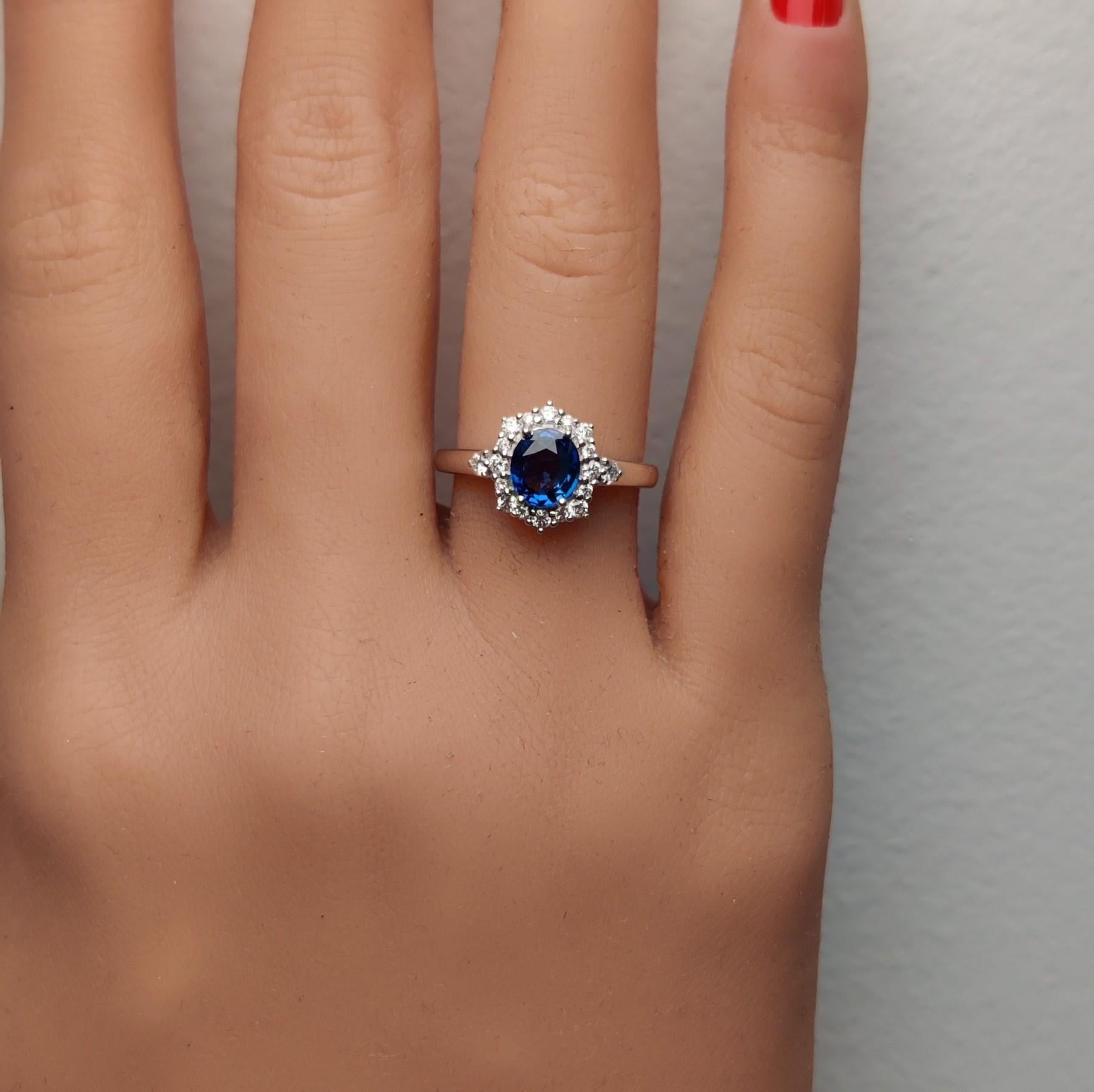 Natural Blue Oval Sapphire and White Diamond 1.27 Carat TW Gold Cocktail Ring