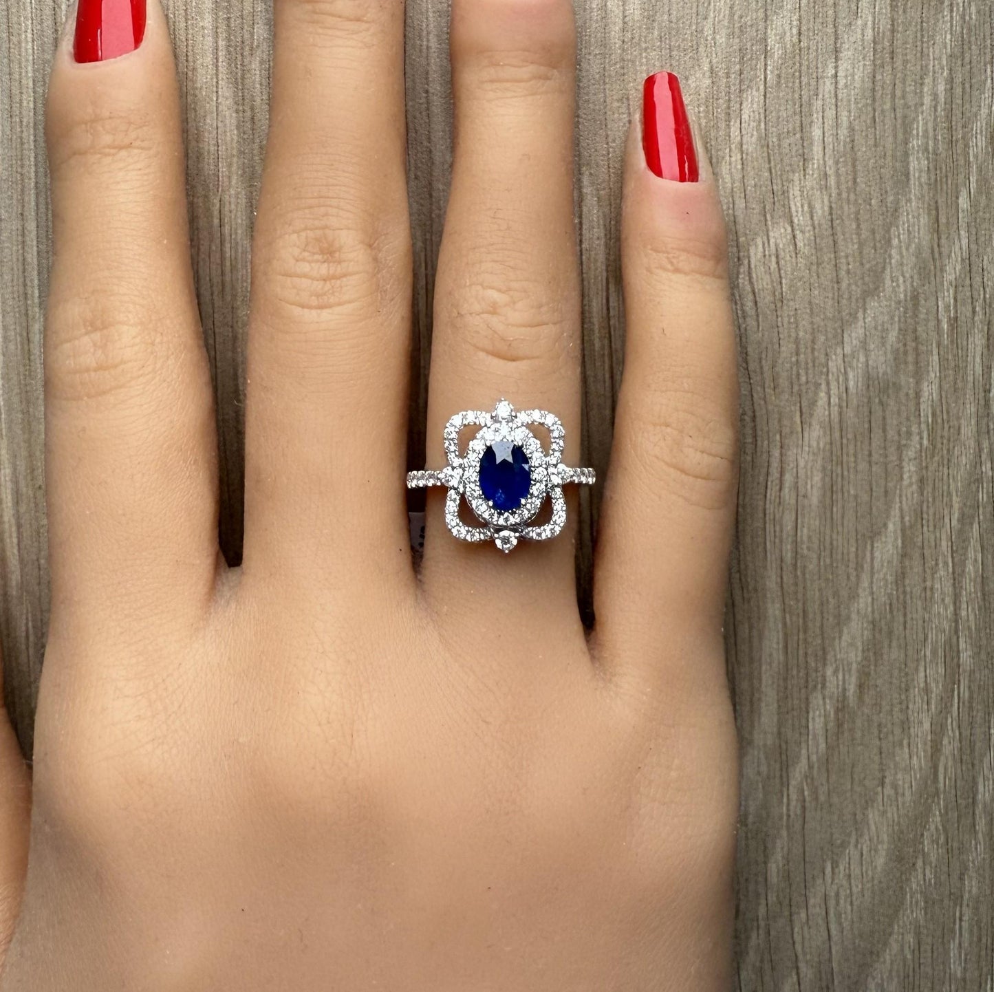 Natural Blue Oval Sapphire and Diamond 1.62 Carat TW Gold Ring