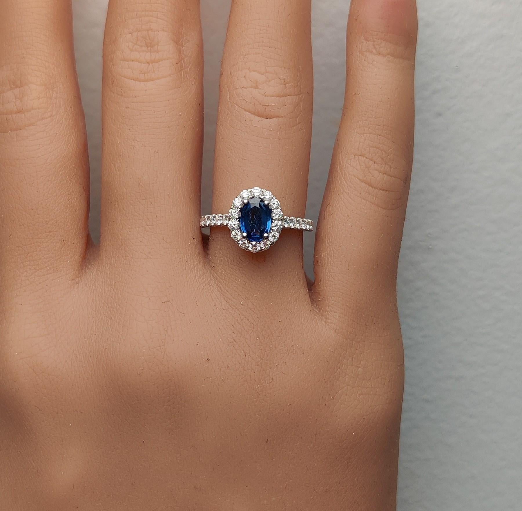 Natural Blue Oval Sapphire and White Diamond 1.47 Carat TW Gold Cocktail Ring