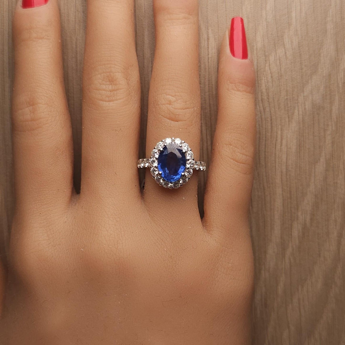 Natural Blue Oval Sapphire and White Diamond 4.93 Carat TW Gold Cocktail Ring