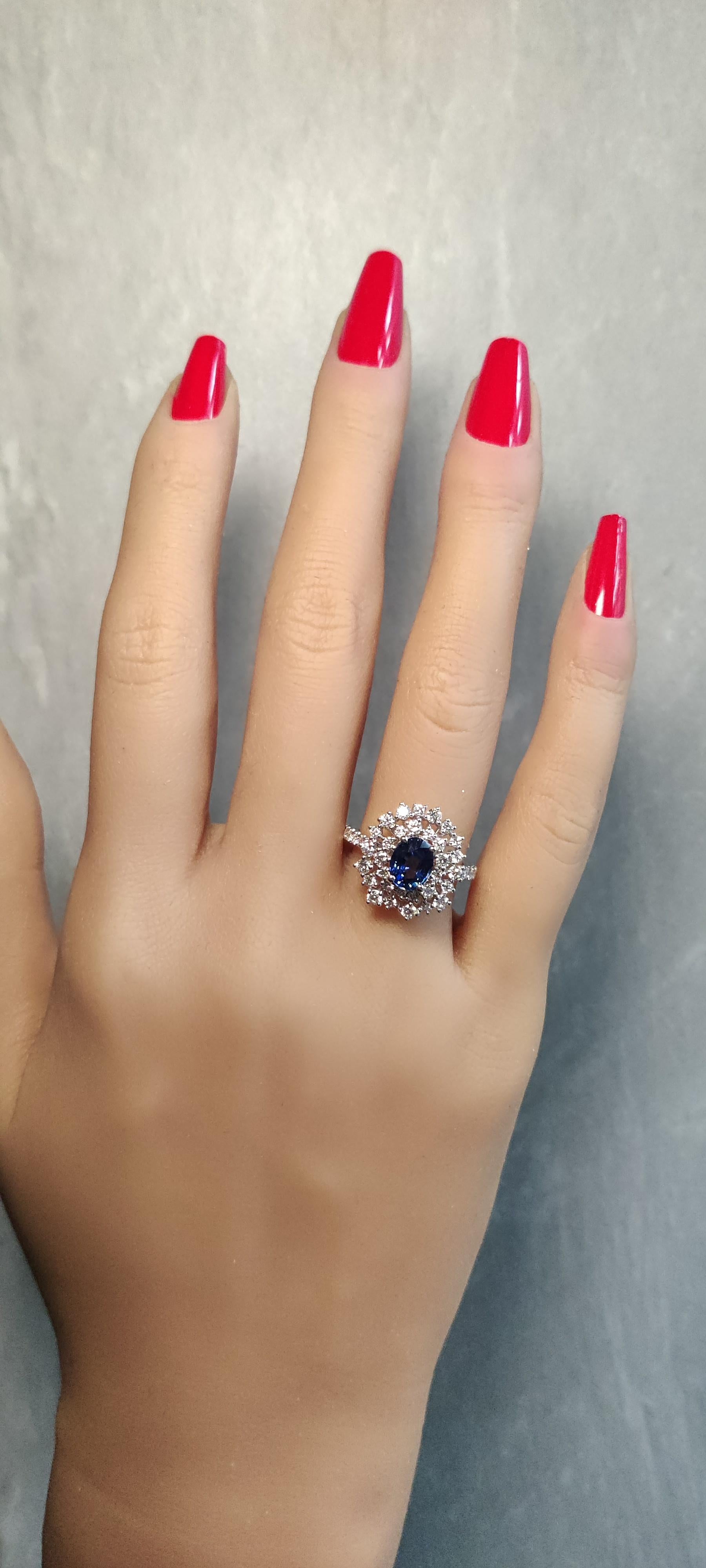 Natural Blue Oval Sapphire and White Diamond 2.86 Carat TW Gold Cocktail Ring