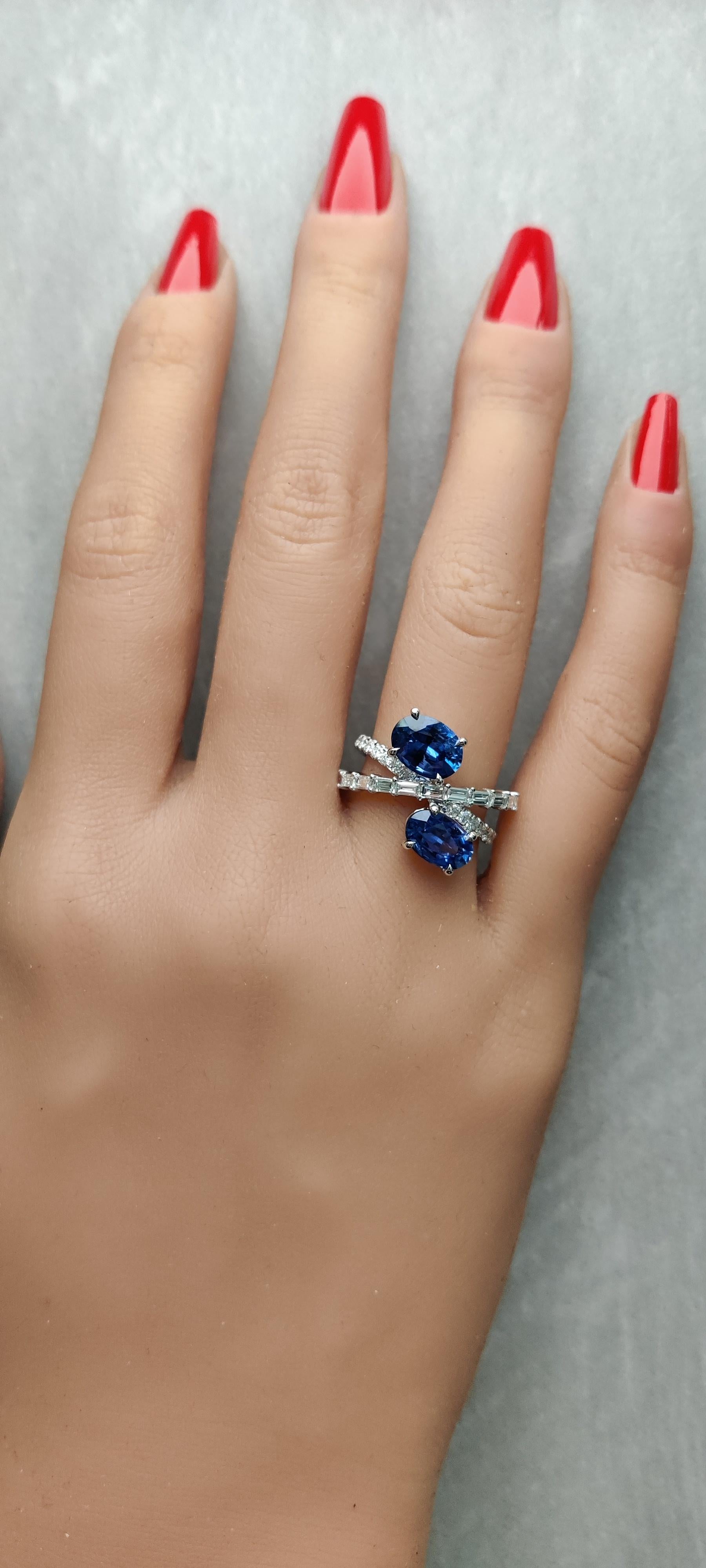Natural Blue Oval Sapphire and White Diamond 4.42 Carat TW Gold Cocktail Ring