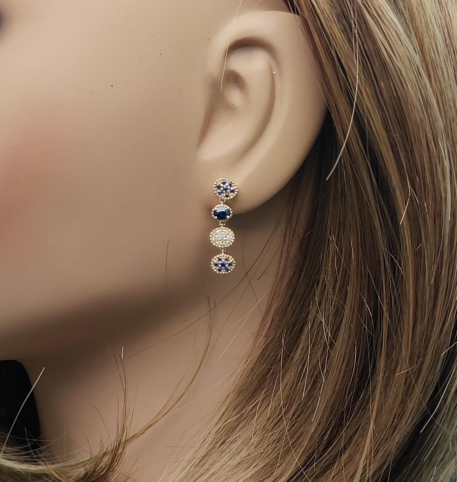 Natural Blue Oval Sapphire and White Diamond 0.87 Carat TW Gold Drop Earrings