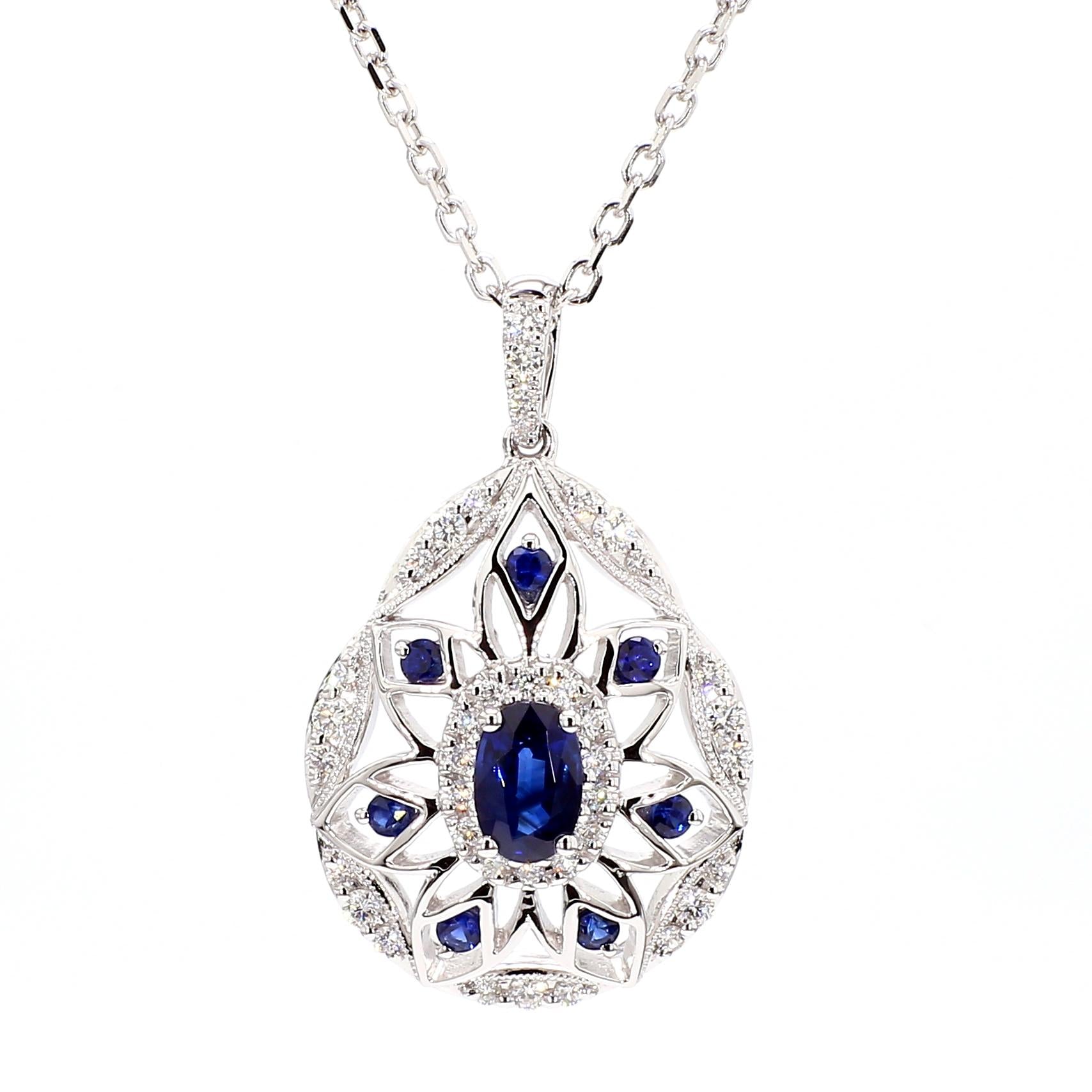 Natural Blue Oval Sapphire and White Diamond 1.08 Carat TW Gold Drop Pendant