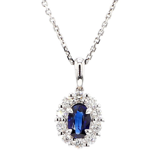 Natural Blue Oval Sapphire and White Diamond .96 Carat TW White Gold Pendant
