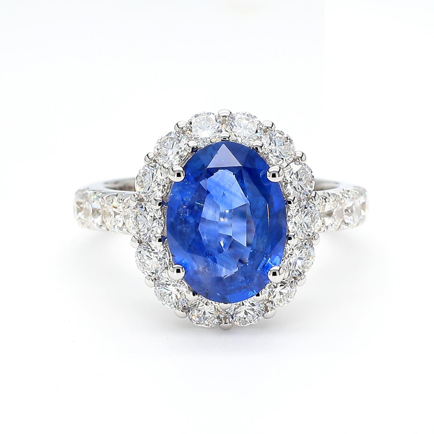 Natural Blue Oval Sapphire and White Diamond 4.93 Carat TW Gold Cocktail Ring