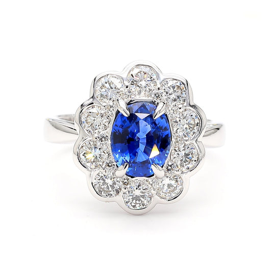 Natural Blue Oval Sapphire and White Diamond 2.86 Carat TW Gold Cocktail Ring