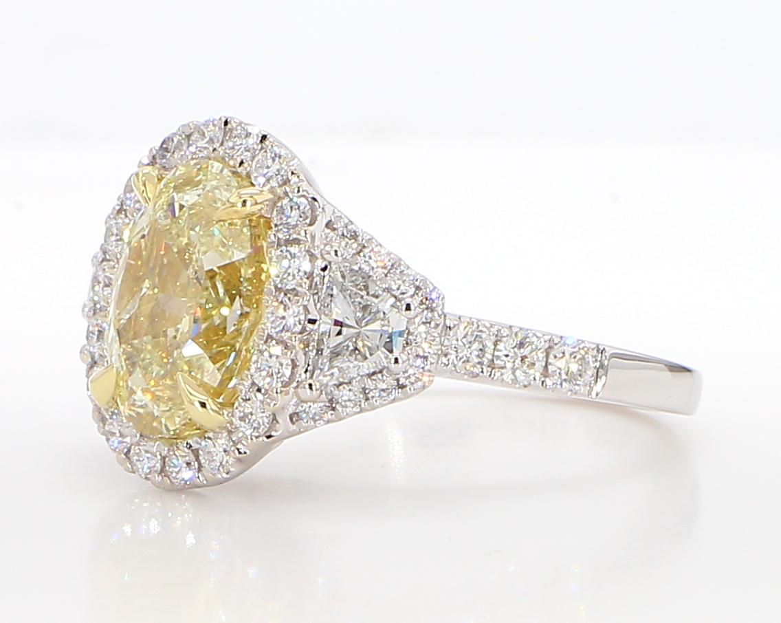 GIA Certified Natural Yellow Oval Diamond 4.06 Carat TW Gold Cocktail Ring