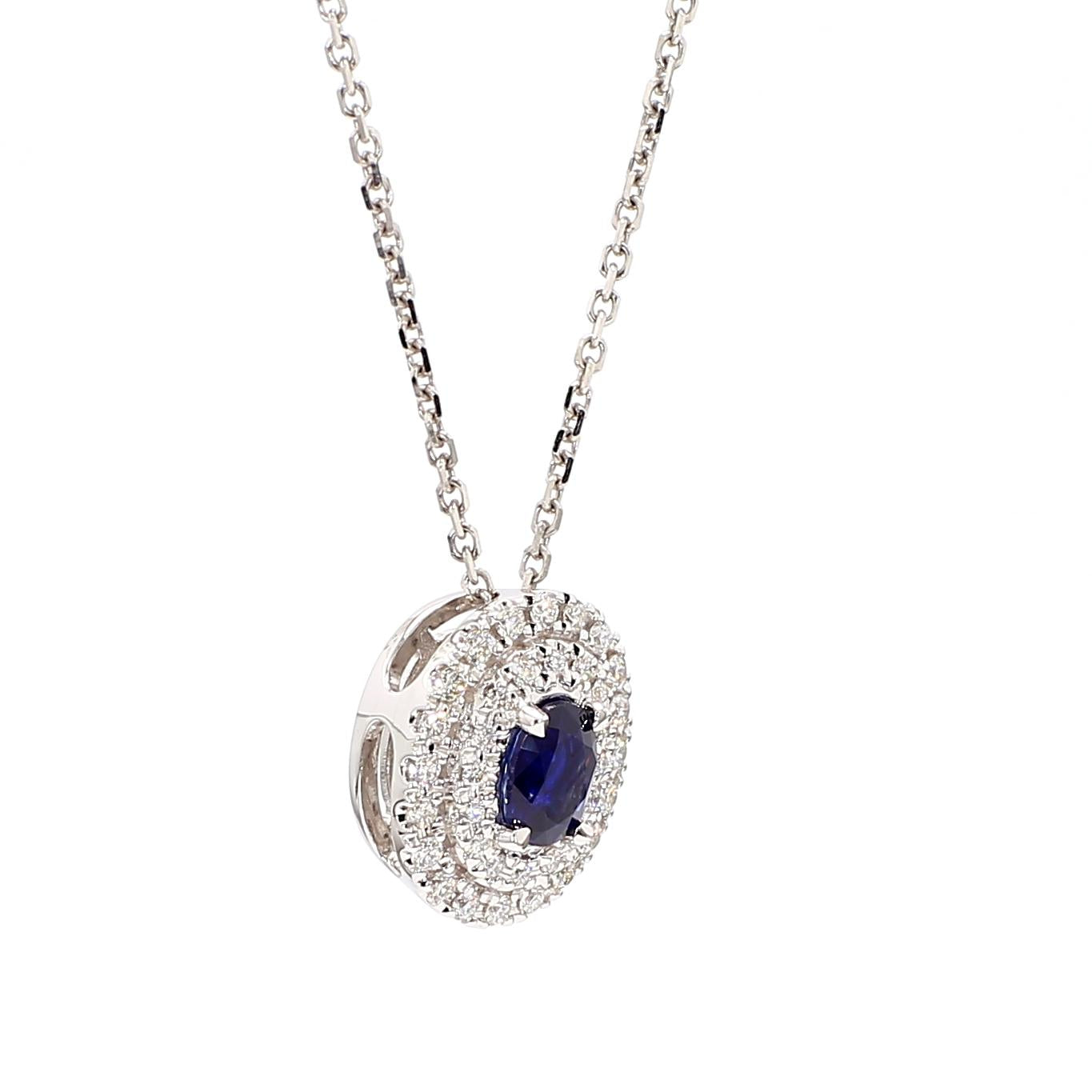 Natural Blue Oval Sapphire and White Diamond .67 Carat TW White Gold Pendant