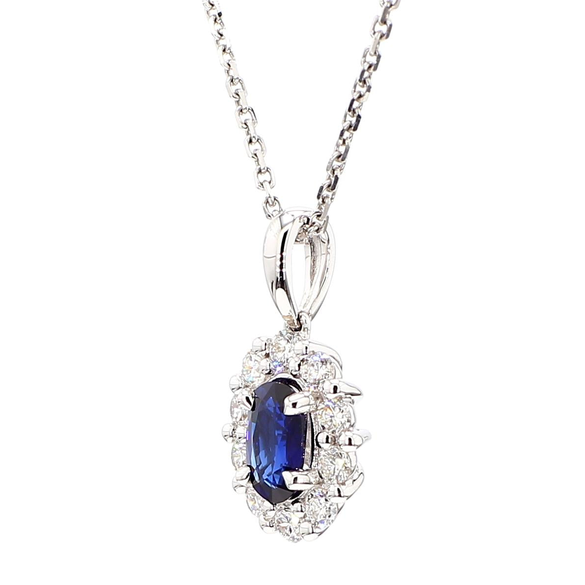 Natural Blue Oval Sapphire and White Diamond .96 Carat TW White Gold Pendant