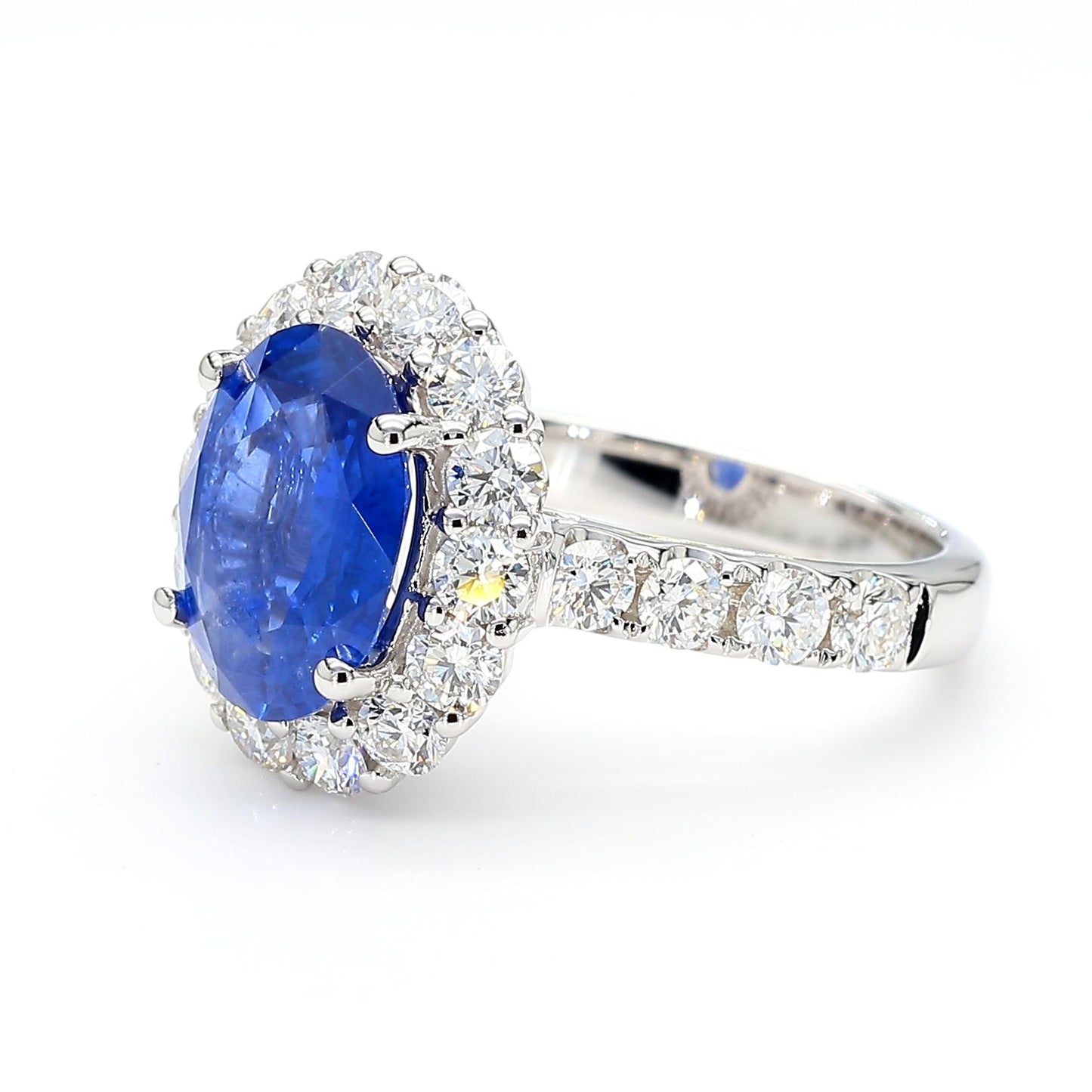 Natural Blue Oval Sapphire and White Diamond 4.93 Carat TW Gold Cocktail Ring
