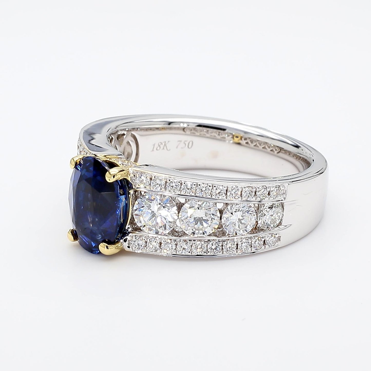 Natural Blue Oval Sapphire and White Diamond 3.22 Carat TW Gold Cocktail Ring
