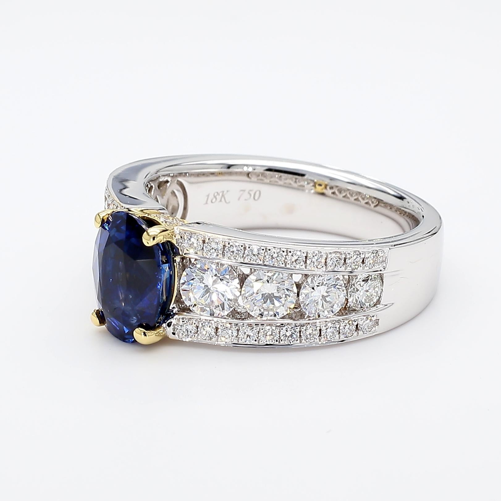 Natural Blue Oval Sapphire and White Diamond 3.22 Carat TW Gold Cocktail Ring