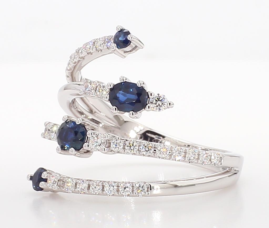 Natural Blue Oval Sapphire and White Diamond 0.90 Carat TW Gold Cocktail Ring