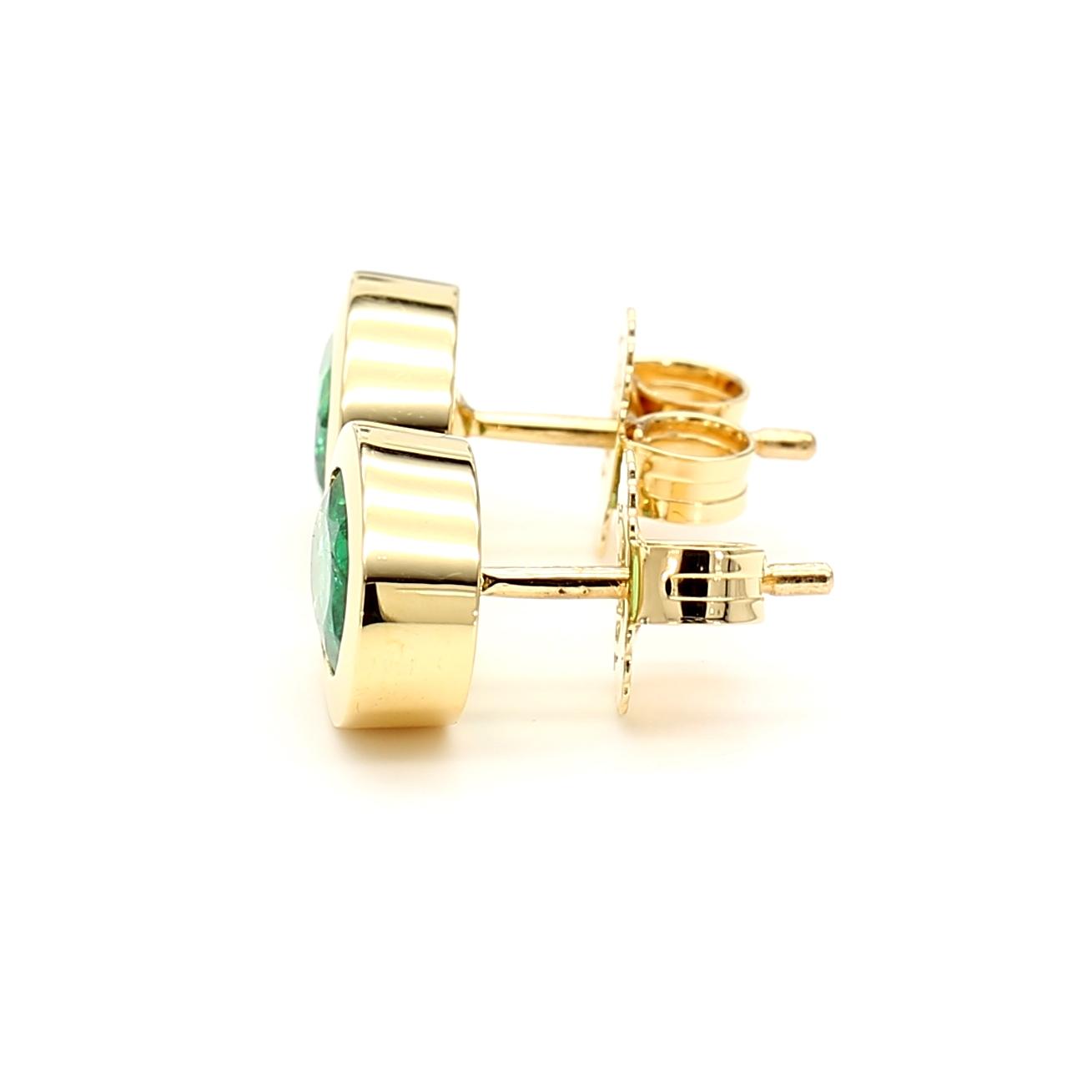 Natural Oval Emerald 1.32 Carat TW Gold Stud Earrings