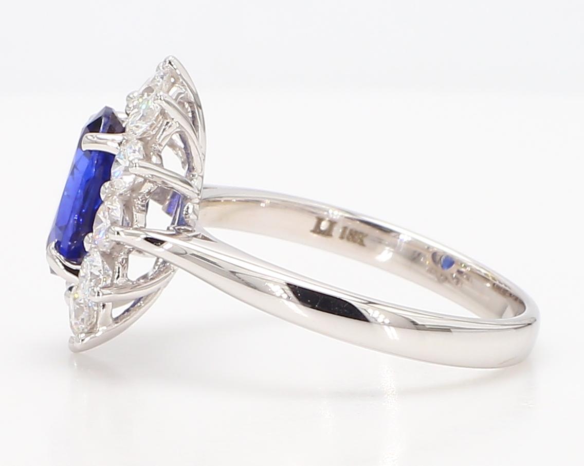 Natural Blue Oval Sapphire and White Diamond 2.88 Carat TW Gold Cocktail Ring