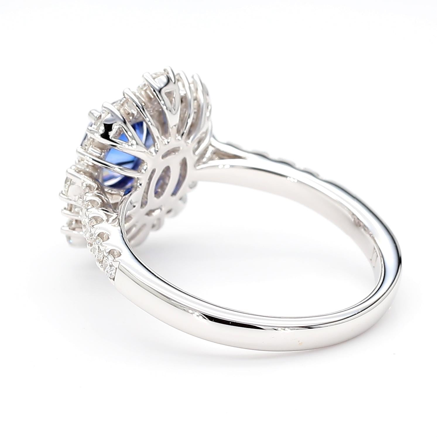 Natural Blue Oval Sapphire and White Diamond 2.11 Carat TW White Gold Ring