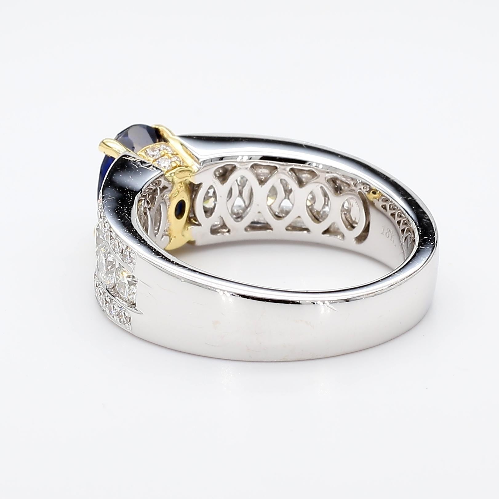 Natural Blue Oval Sapphire and White Diamond 3.22 Carat TW Gold Cocktail Ring