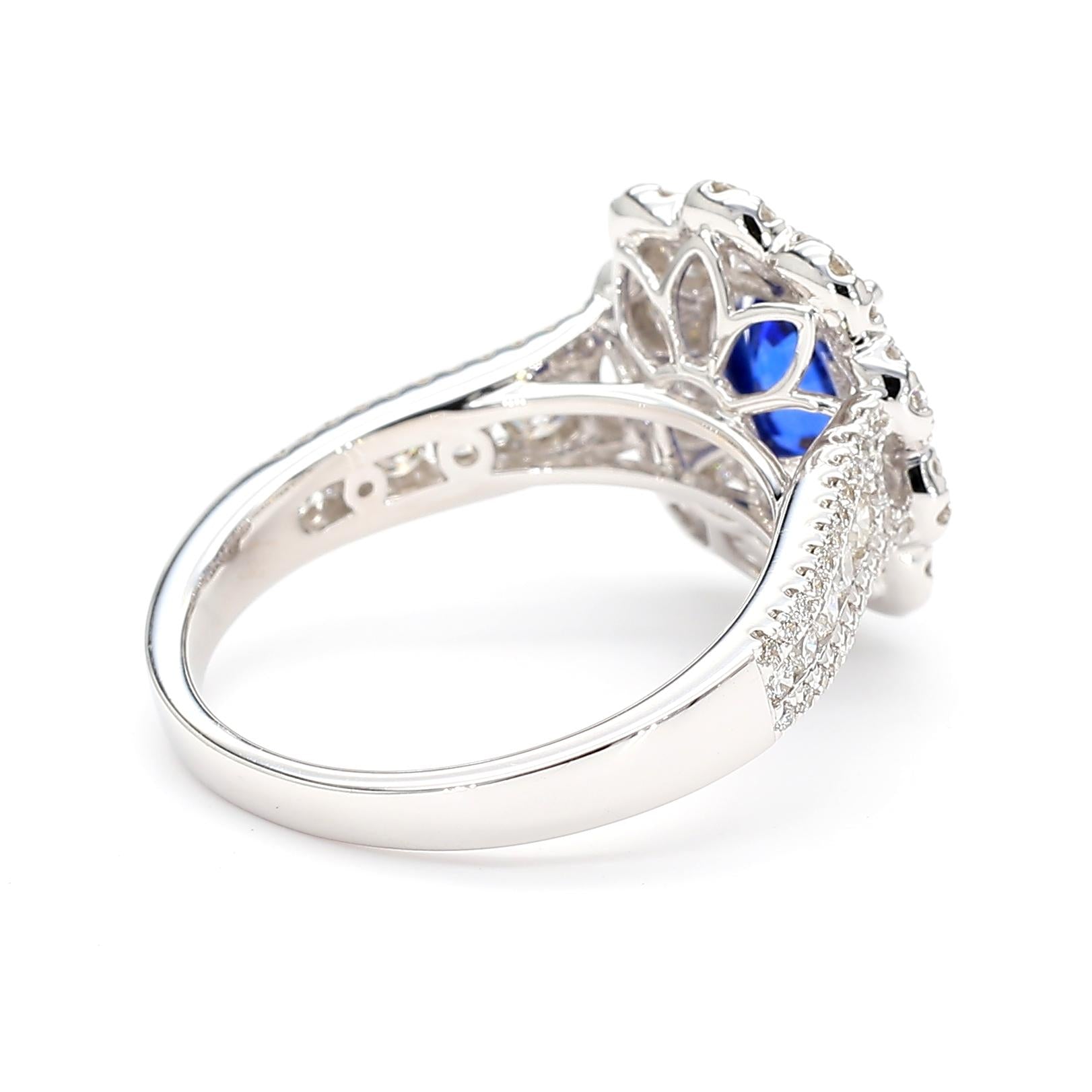 Natural Blue Oval Sapphire and White Diamond 2.44 Carat TW Gold Cocktail Ring