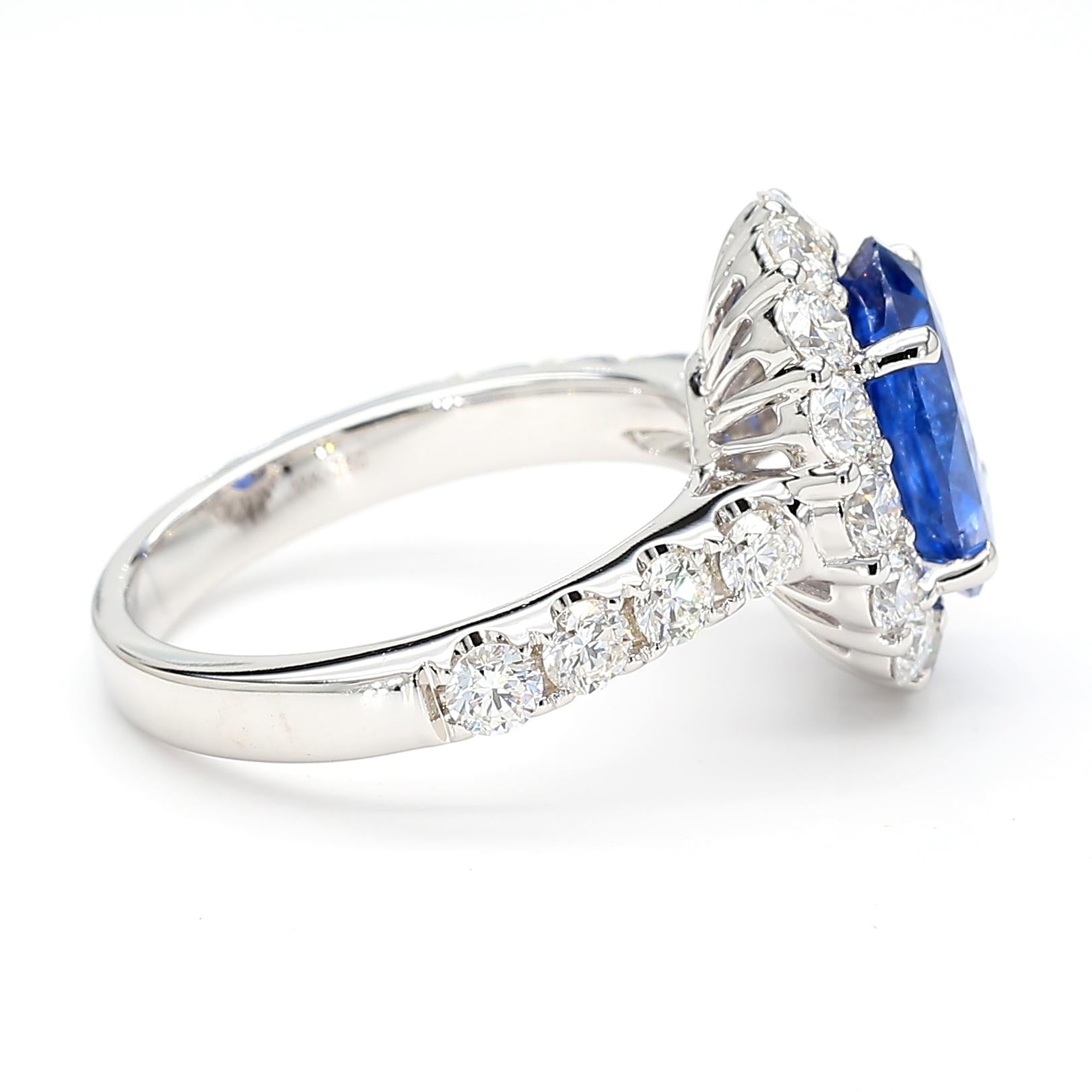 Natural Blue Oval Sapphire and White Diamond 4.93 Carat TW Gold Cocktail Ring
