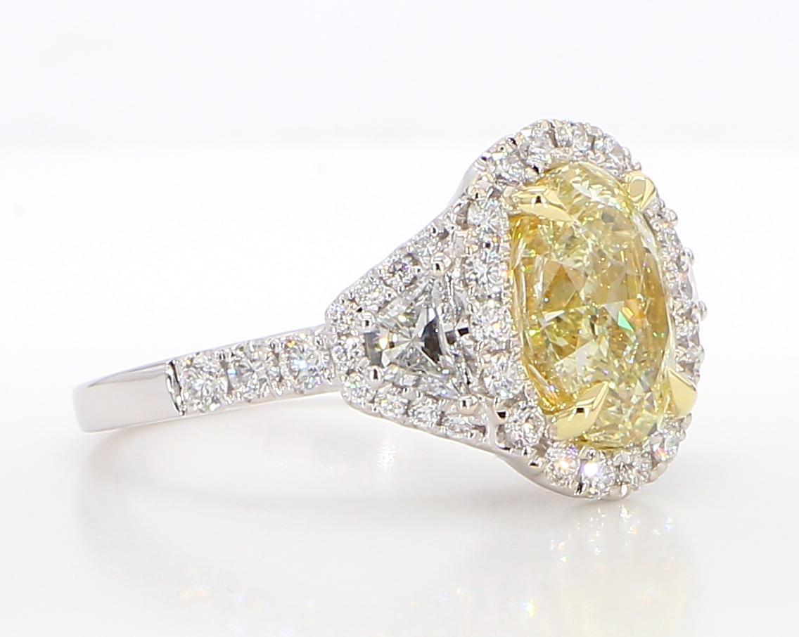 GIA Certified Natural Yellow Oval Diamond 4.06 Carat TW Gold Cocktail Ring