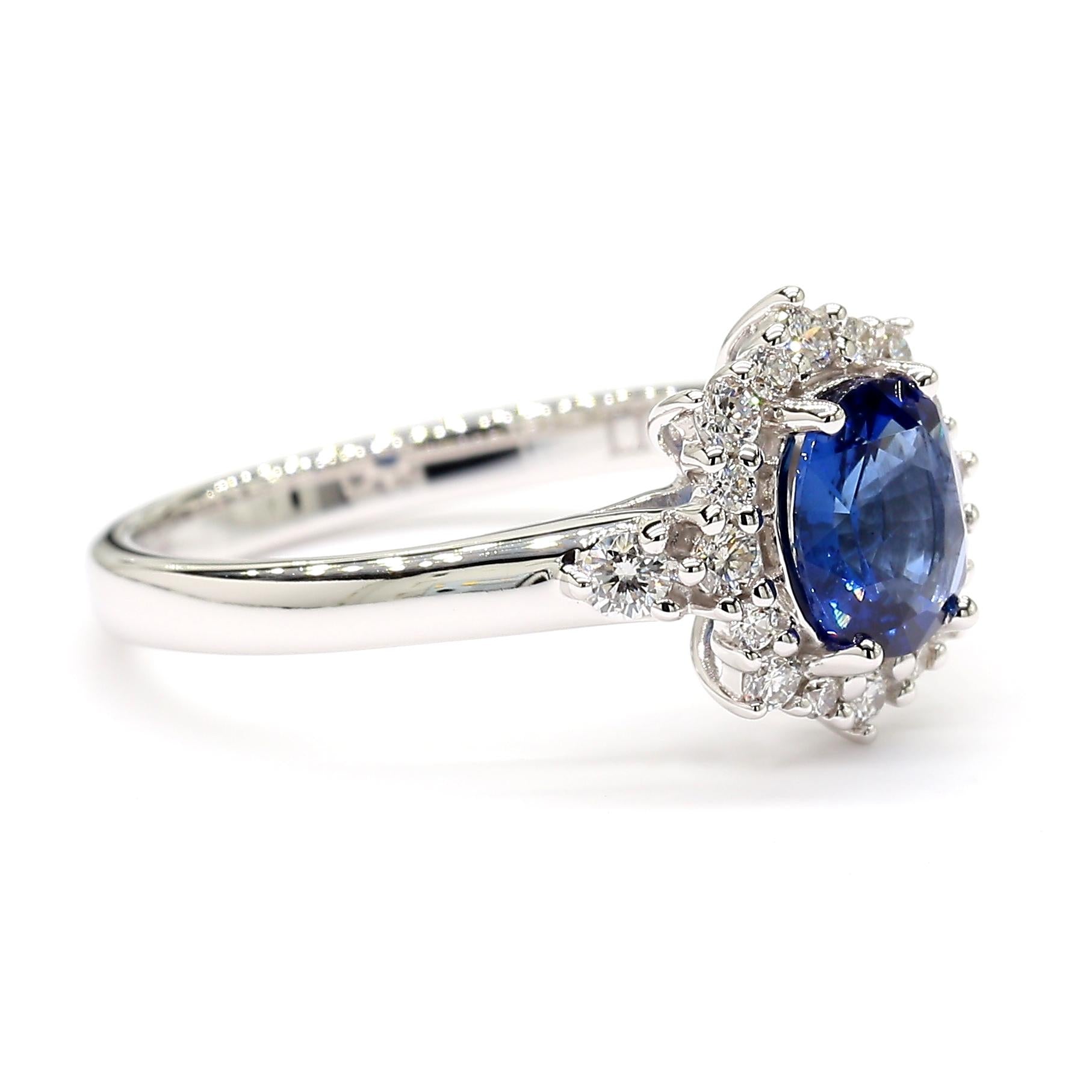 Natural Blue Oval Sapphire and White Diamond 1.27 Carat TW Gold Cocktail Ring