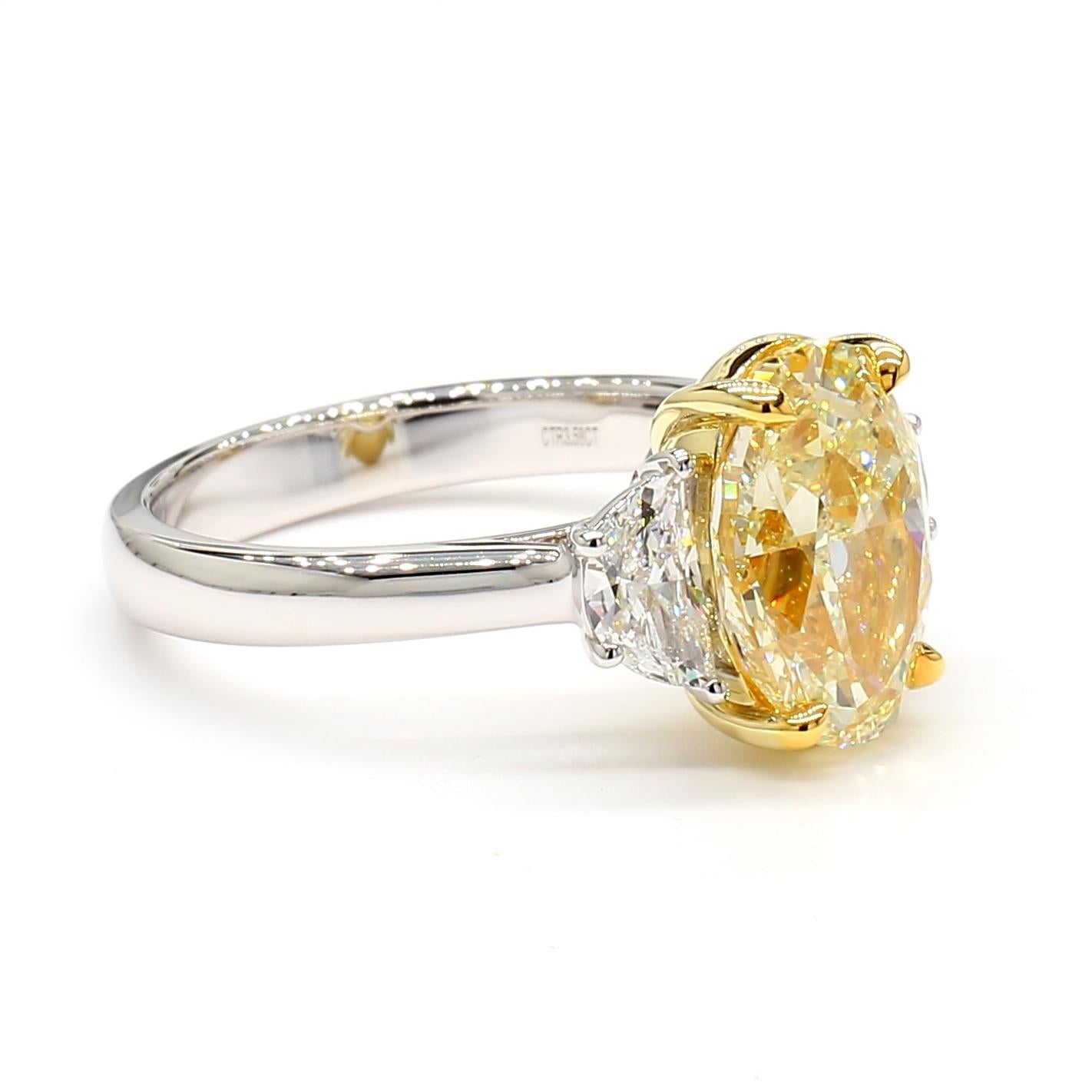 GIA Certified Natural Yellow Oval Diamond 4.04 Carat TW Gold Cocktail Ring