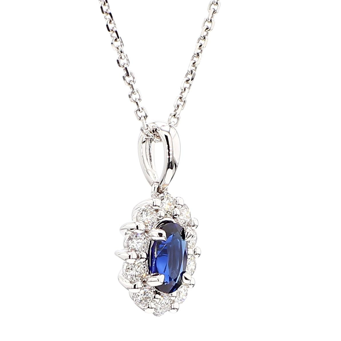 Natural Blue Oval Sapphire and White Diamond .96 Carat TW White Gold Pendant