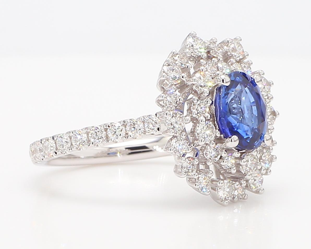 Natural Blue Oval Sapphire and White Diamond 2.86 Carat TW Gold Cocktail Ring