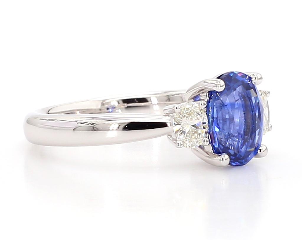 Natural Blue Oval Sapphire and White Diamond 2.37 Carat TW Gold Cocktail Ring