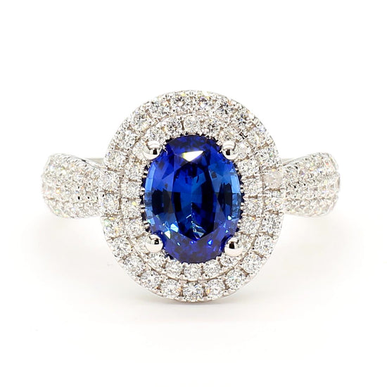 Natural Blue Oval Sapphire and White Diamond 2.81 Carat TW Gold Cocktail Ring